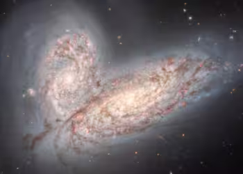12.8 Billion Years Ago: Two Galaxies Unite