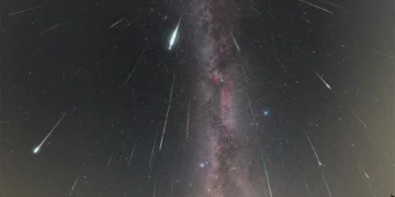 image was taken during the 2018 Perseids from the Poloniny Dark Sky Park in Slovakia. The dome of the observatory in the foreground is on the grounds of Kolonica Observatory.