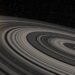 Artist’s conception of the extrasolar ring system circling the young giant planet or brown dwarf J1407b. The rings are shown eclipsing the young Sun-like star J1407, as they would have appeared in early 2007. Credit: Ron Miller